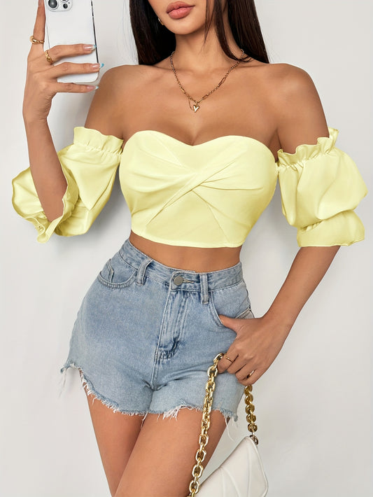 A Stylish Spring Top for Women Featuring a One-Shoulder Design, Low-Cut Neckline, Sweet Bow, And Lantern Sleeves, Designed to Be Form-Fitting And Cropped.
